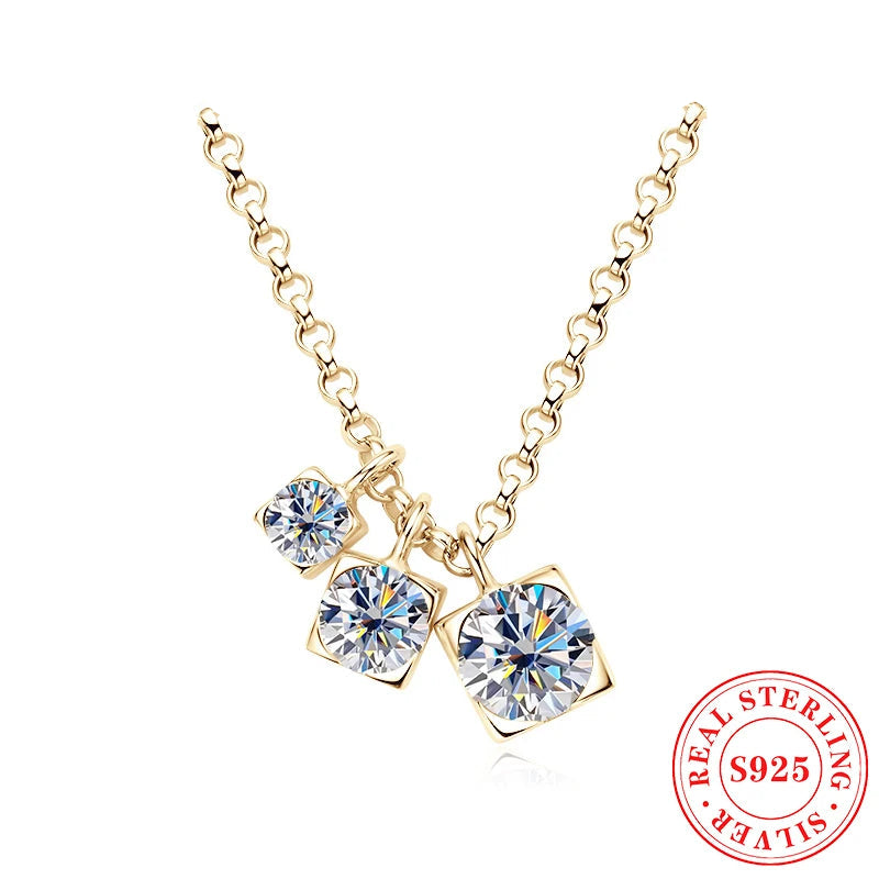 Gold necklace with three heart-shaped gemstones 